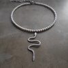 Venomous snake stilrent orm halsband i minimalitstisk stil